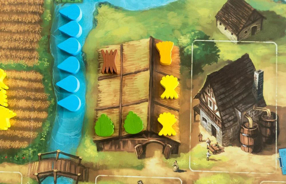 Beer & Bread 2-player card game with wooden tokens and illustrated building cards.