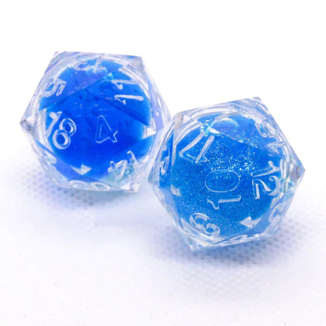 Blue Liquid Core Sharp Edge Resin RPG Dice Set with clear dice and blue glittery centers.