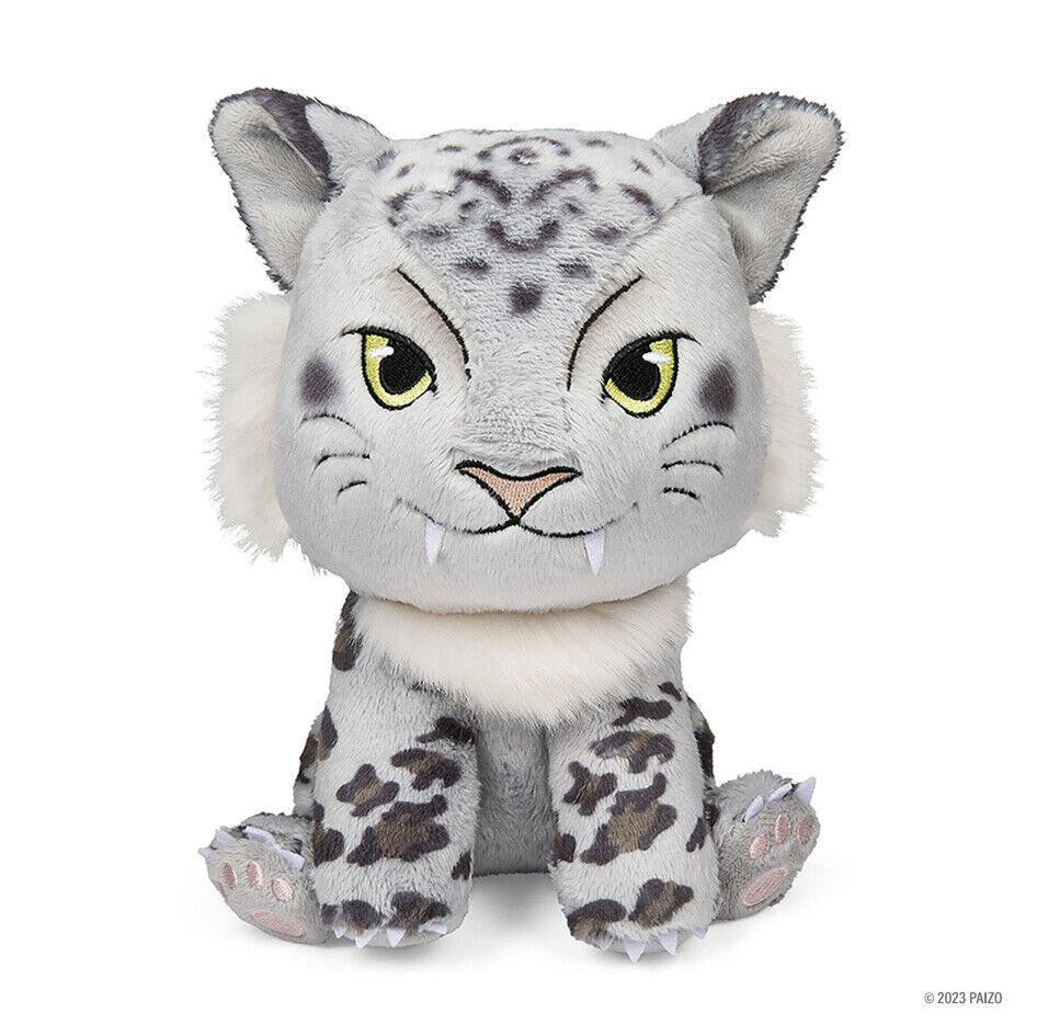 Droogami Phunny Plush - Pathfinder, a snow leopard plush with yellow eyes, small fangs, and spotted fur sitting forward.