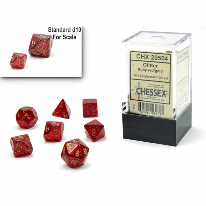 Glitter Polyhedral 7-die set in ruby red and gold next to a clear Chessex box labeled Glitter Ruby red/gold.