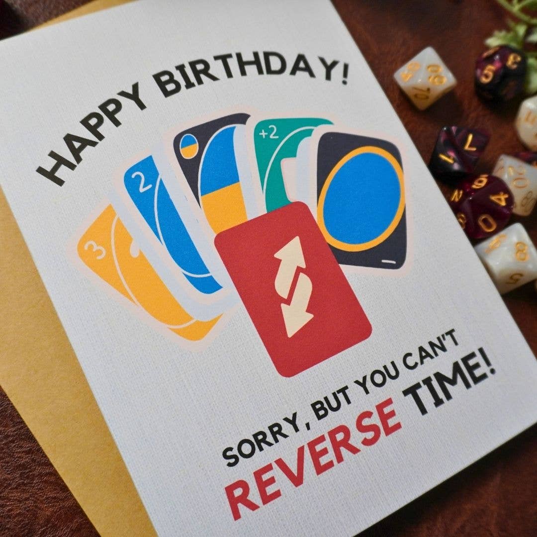 UNO birthday card, 5x7 inches, featuring UNO cards, dice, and playful text.