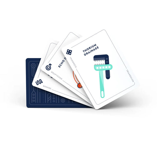 Four playing cards from the Spaceteam Triangulum Expansion featuring tech items.