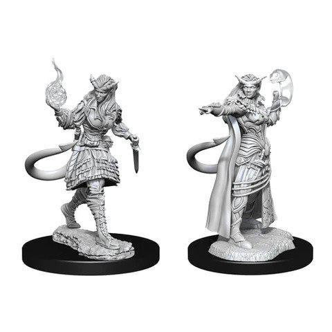 Two unpainted Tiefling Sorcerer Female D&D: NMU miniatures with horns and tails on black circular bases.