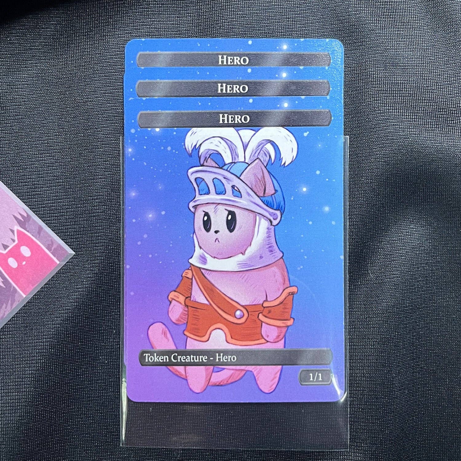 Hero Token Set featuring a pink hero in armor on a blue star background; suitable for Hero tokens or Onion Knights.