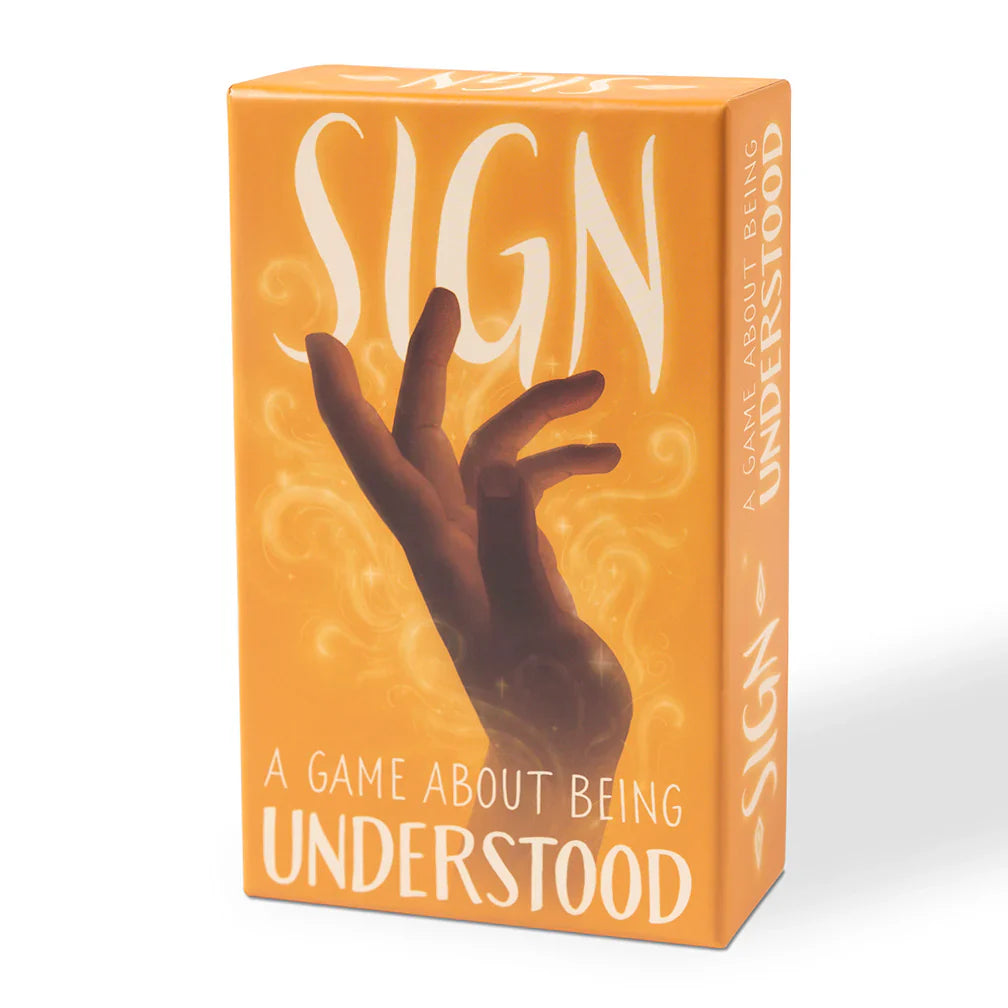 Orange box for Sign: A Game About Being Understood, a silent language creation board game, with a hand on the cover.