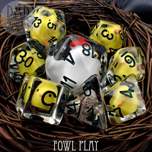 The Fowl Play - 8 Dice Set with yellow and clear resin dice featuring bird designs.