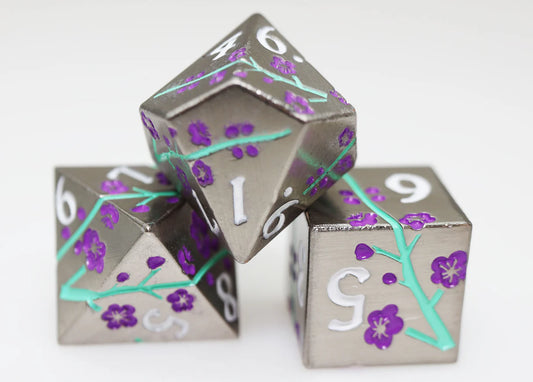 Metallic Bouquet: Silvered Jackmanii Metal RPG Dice Set featuring purple flower dice with green stems on white surface.