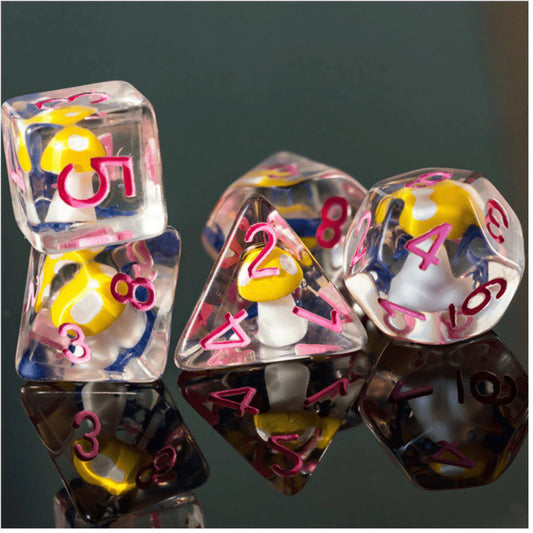 Fairytale Mushrooms RPG Dice Set with pink numbers and small yellow-white mushrooms on each die.