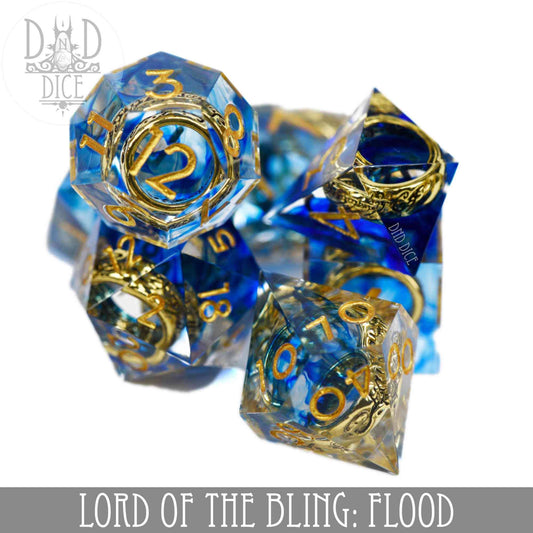 Handmade 7-dice blue and gold DND set with gold numbers, labeled Lord of the Bling: Flood.