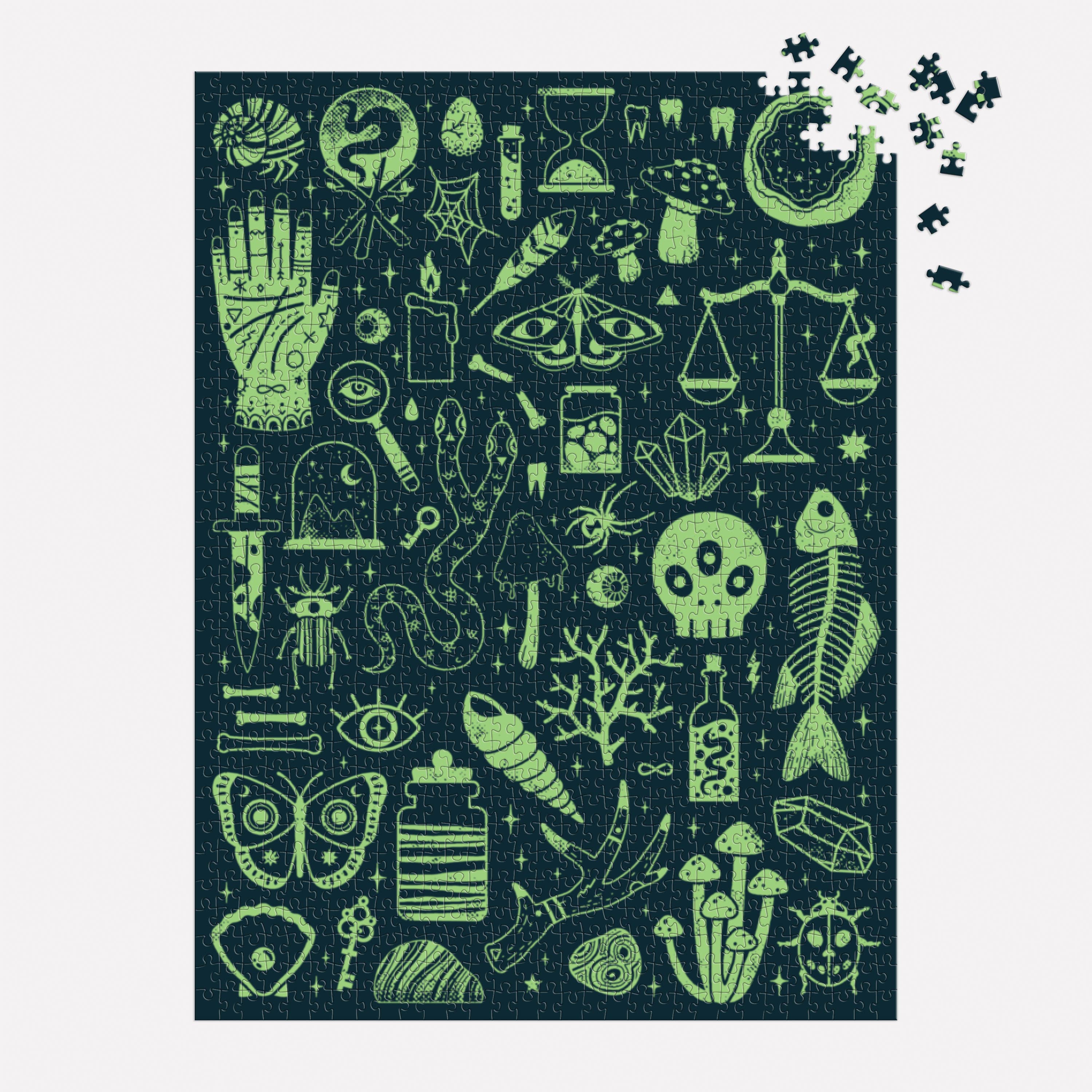 Occult and Curious 1000 Piece Glow in the Dark Puzzle with mystical icons on a dark background.