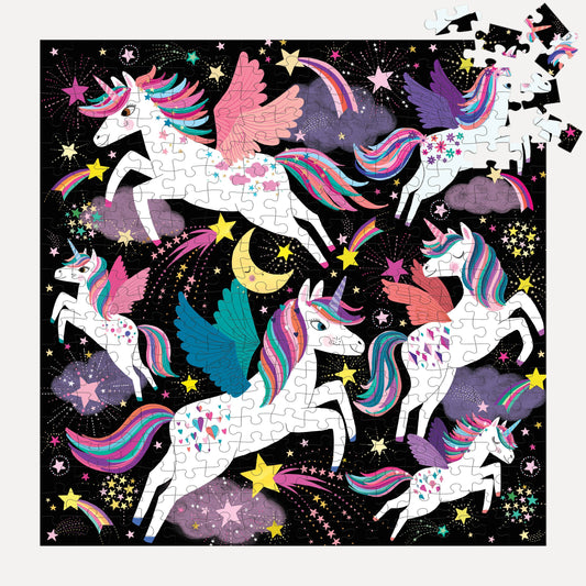 Unicorns Illuminated 300 Piece Glow in the Dark Puzzle featuring five winged unicorns among stars.