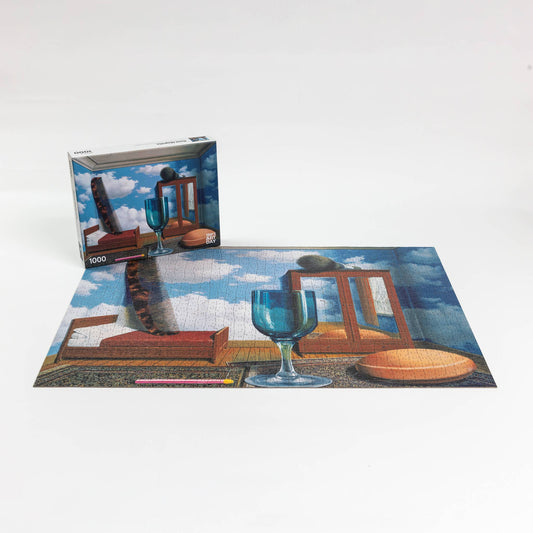 Completed 1000-piece René Magritte Personal Values puzzle with Belgian surrealist art and box included.