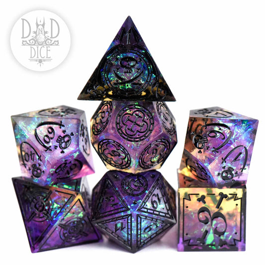 Black Beards Blight handmade resin dice set with iridescent colors and black numbers.