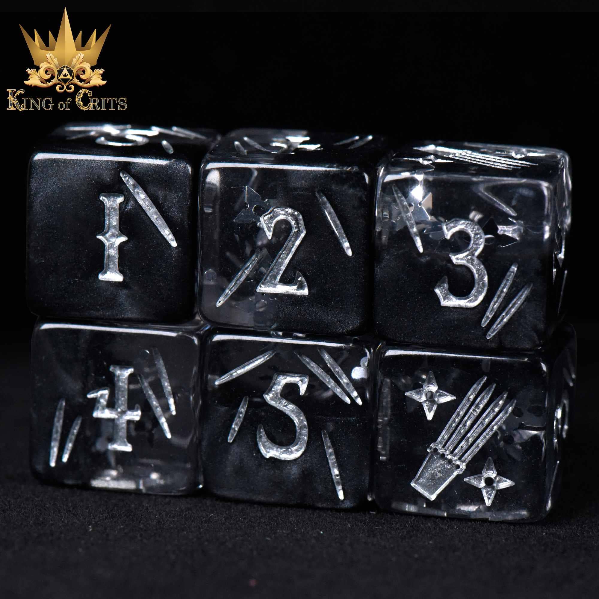 The Art of Stealth 11 Dice Set featuring black resin dice with silver numbers and King of Crits logo on each die.