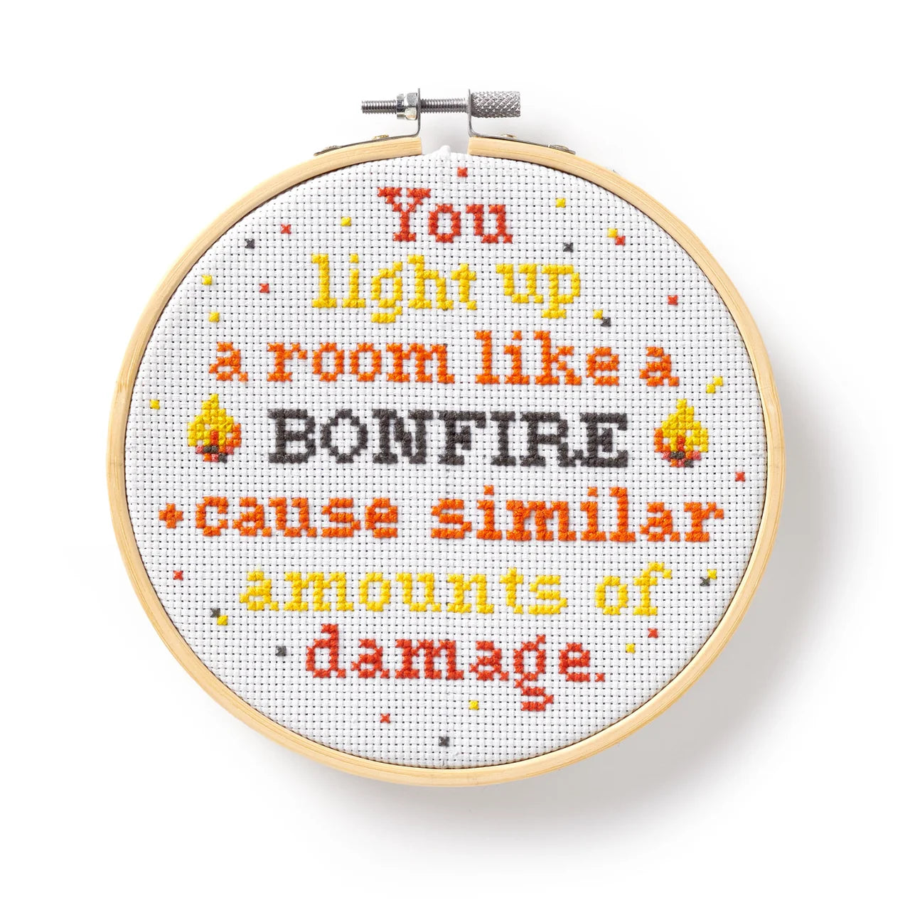 You Light Up A Room Cross Stitch Kit with hoop, displaying text: You light up a room like a BONFIRE.