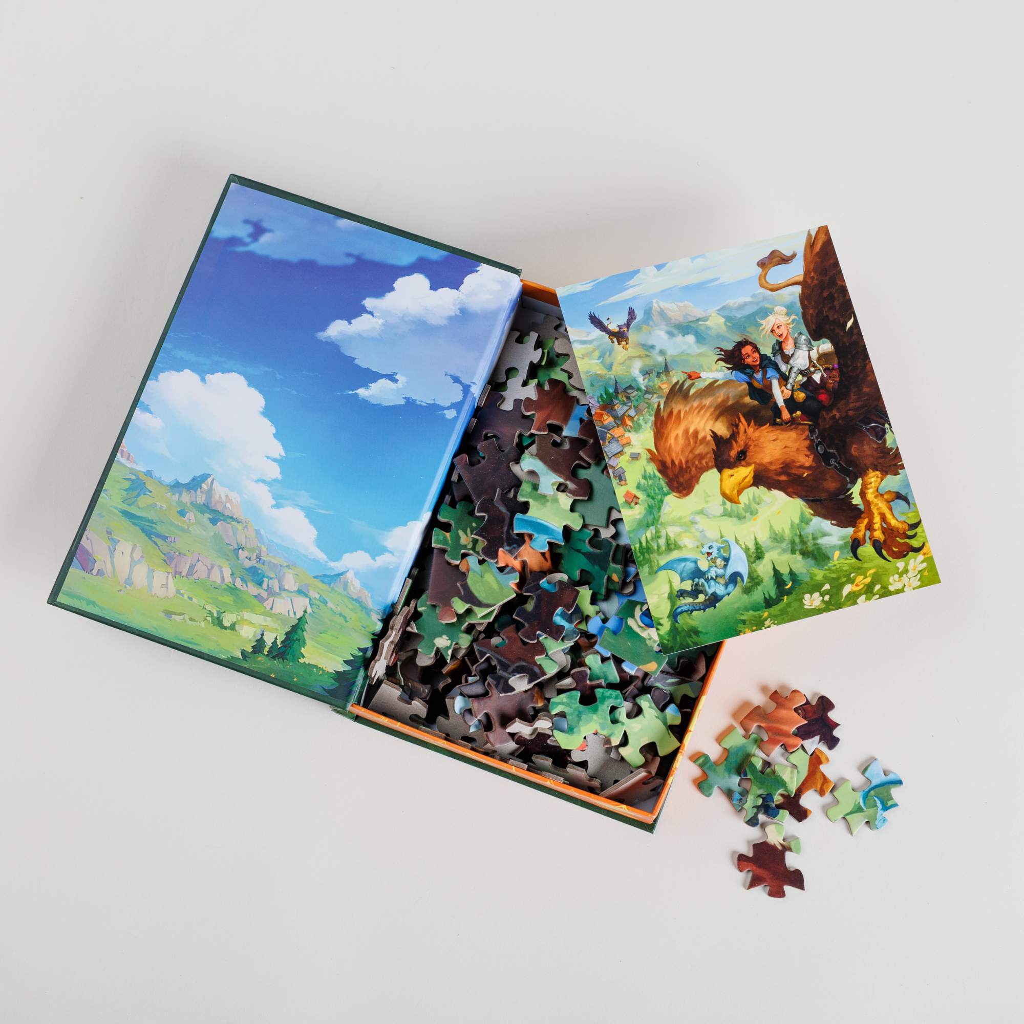 Tea You in the Skies Keepsake Puzzle by Tomes & Tea, book-shaped box with puzzle pieces visible.