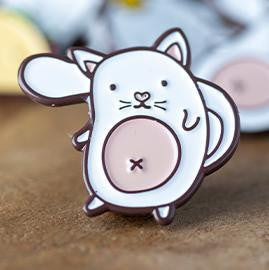 Cartoon-style Cat Enamel Pin TCGCP featuring a chubby white cat with pink belly, one floppy ear, and brown base.