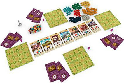 Strategy board game featuring cards, colorful tokens, cubes, player boards, and a spinner, similar to Tiny Towns.