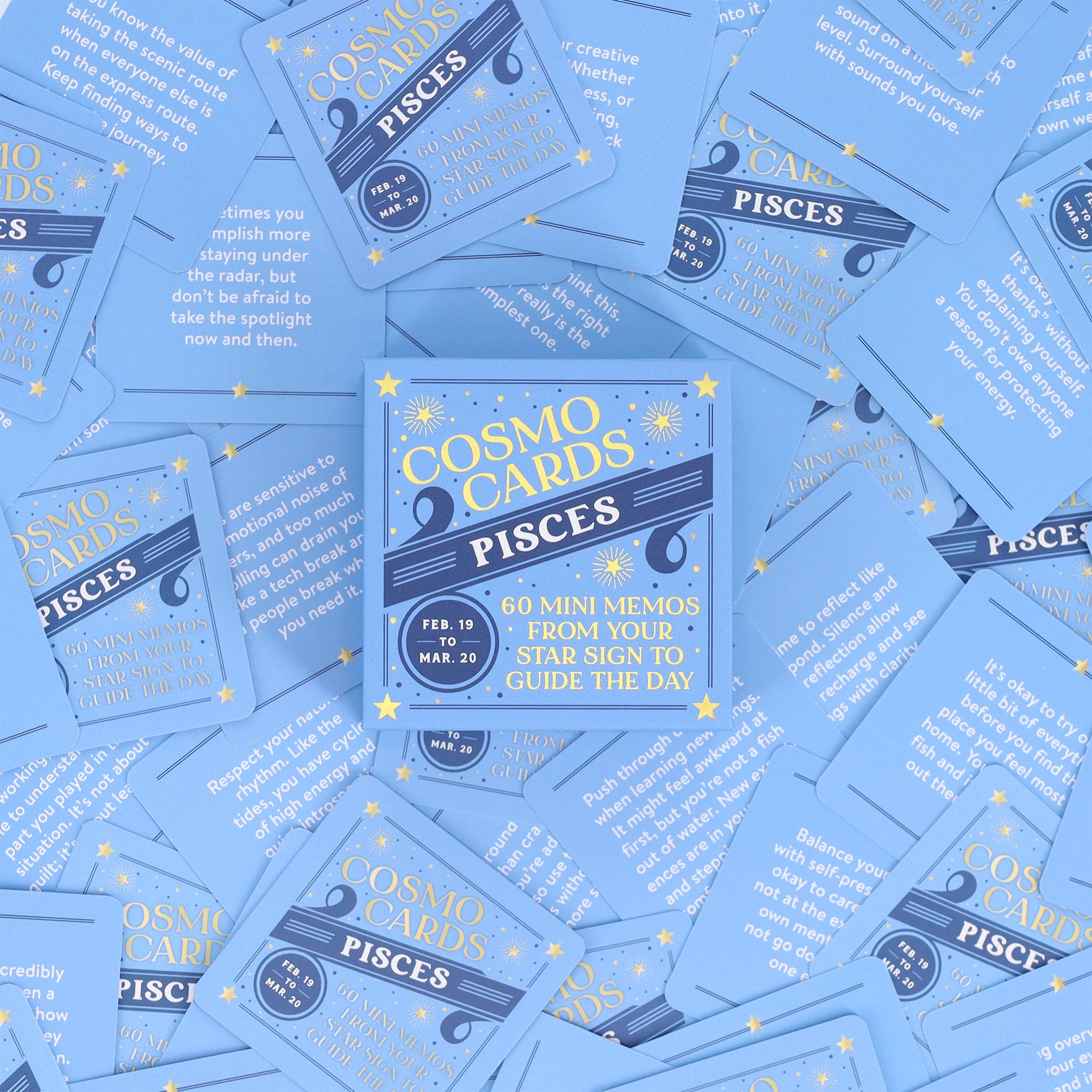 Cosmo Cards for Pisces oracle deck in blue with gold and white text, box shown with matching cards.