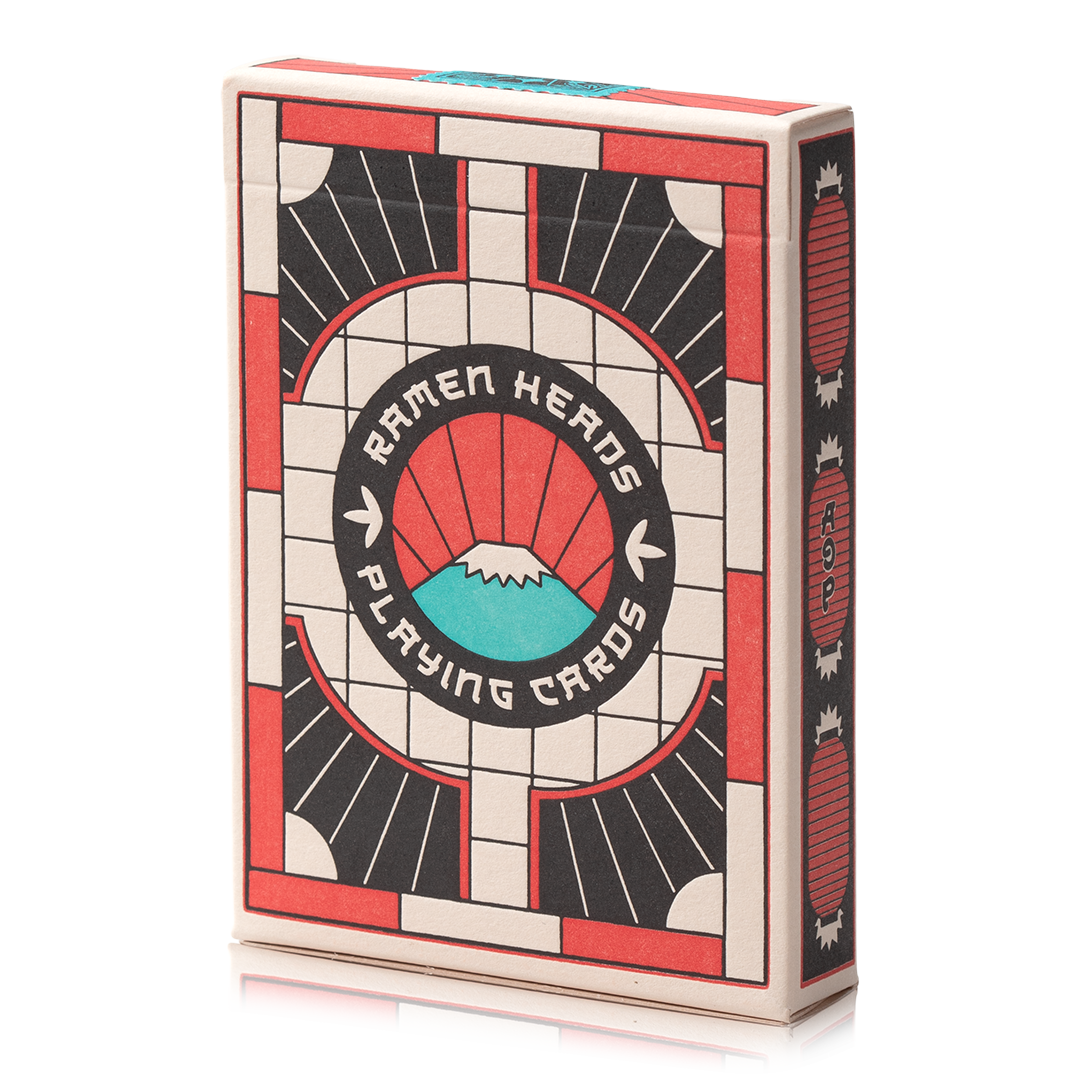 Ramen Heads playing cards in a box with mountain graphic and text.