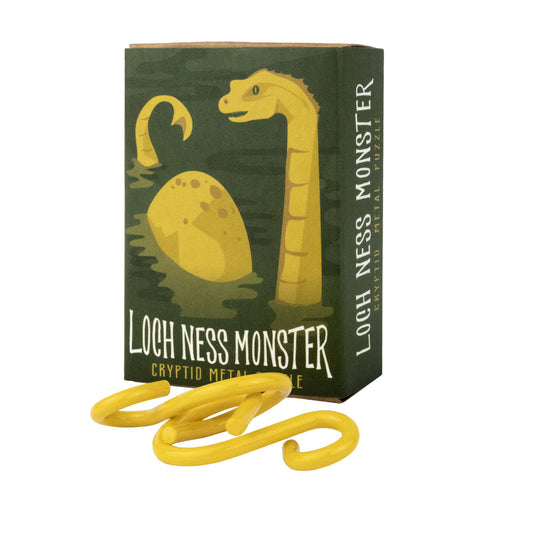 Yellow, wavy Loch Ness Monster brainteaser displayed with Cryptid Puzzlebox packaging.