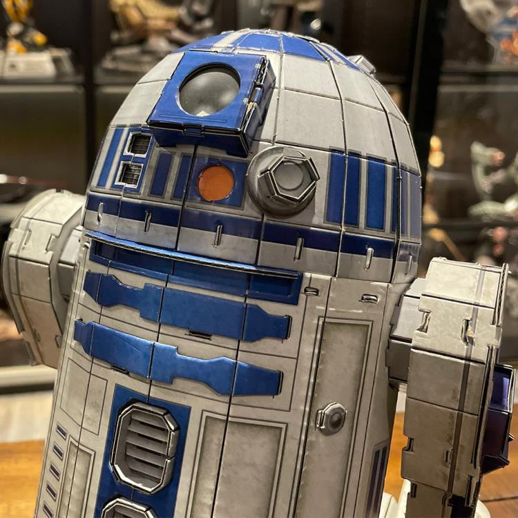 4D Star Wars Model R2-D2 with blue, white, and silver panels shown indoors.