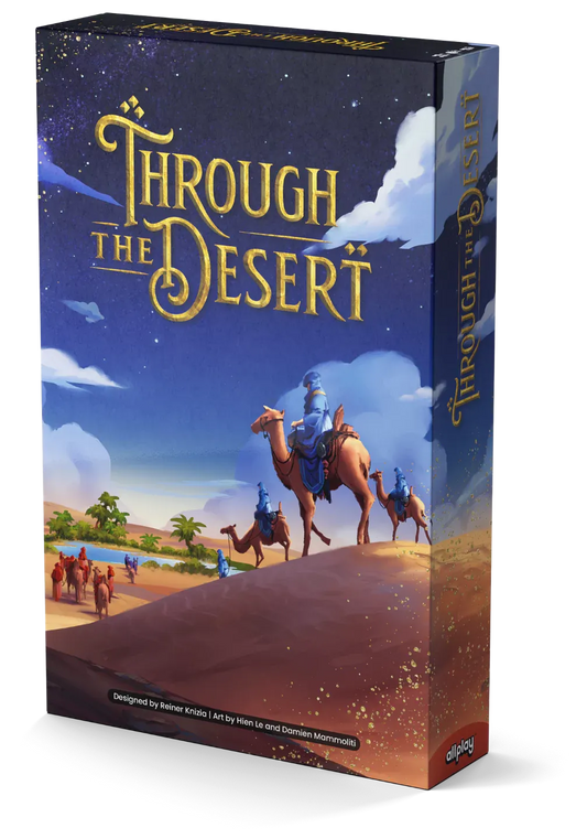 Through the Desert board game box featuring camel riders crossing dunes under a blue sky.