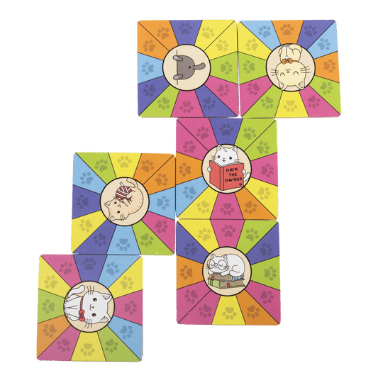Kitty Litter matching card game featuring colorful cards with kawaii kitties and paw prints for children.