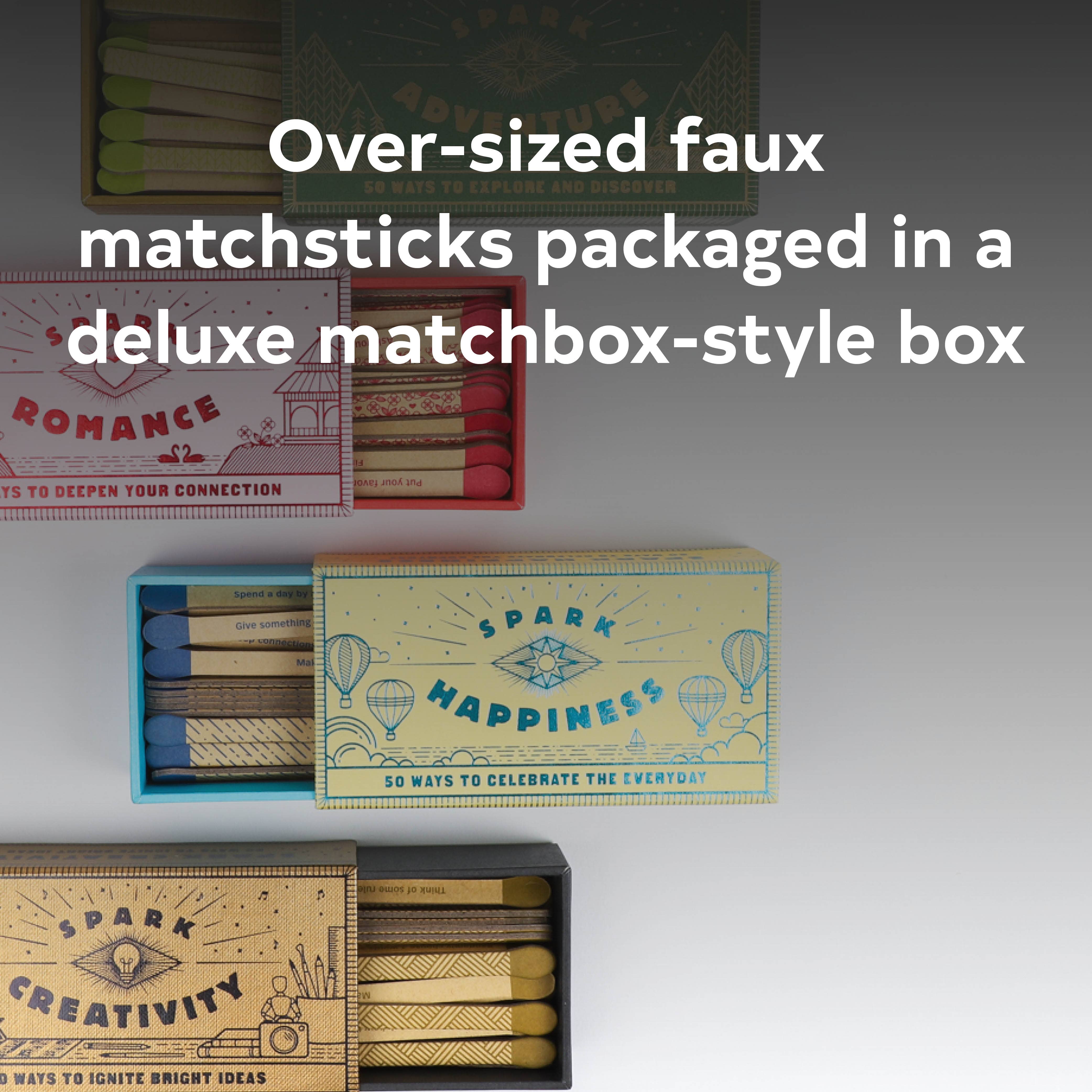 Spark Creativity box containing oversized matchsticks.