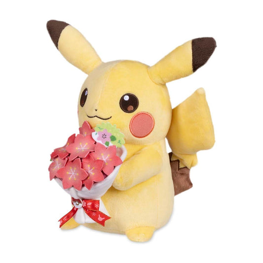 Pikachu plush, 12 ¼ in., holding Gracidea bouquet with red ribbon, Pokémon Center Original.