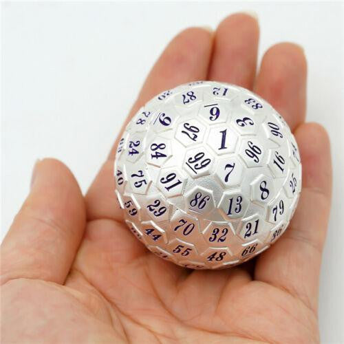 100 Sided Die - Silver, metal D100 with polyhedral design, held in a hand.