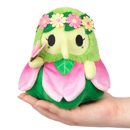 Squishable Alter Ego Plague Doctor - Nymph plushie with a flower crown and felt leaf chest held in a hand.