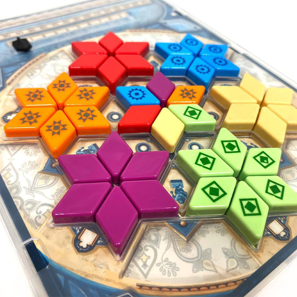 Azul Mini Summer Pavilion board game with colorful pieces on a patterned board.