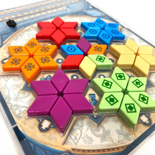 Azul Mini Summer Pavilion board game with colorful pieces on a patterned board.