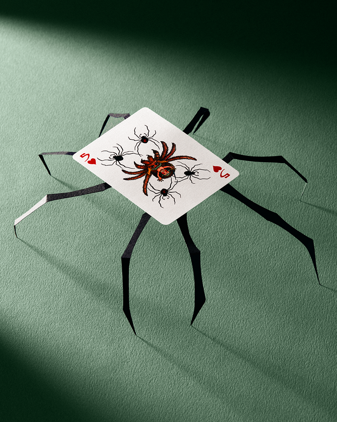 Five of hearts from the William Stout Fantasy Playing Cards deck, featuring black paper-cutout spider legs.
