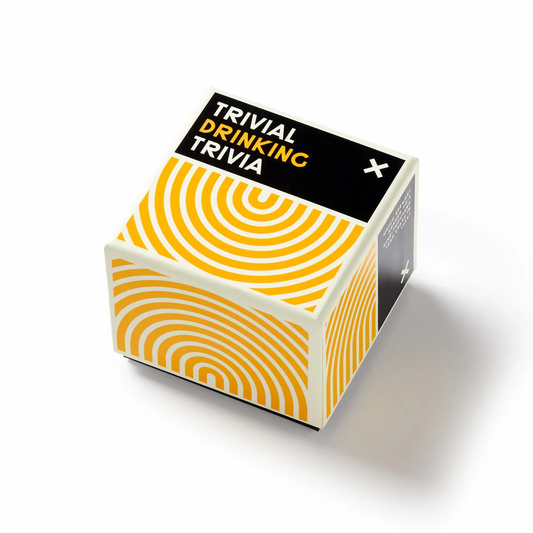 Trivial Drinking Trivia party game in a cube-shaped box with yellow and black spiral design.