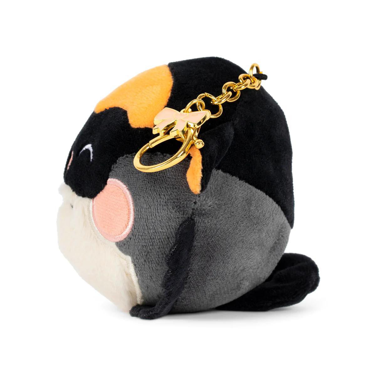 Mister 3-Inch Hanger Plush, round black and orange keychain with lobster clasp.