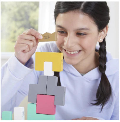 Jenga Maker - Jenga for Teams game with colorful blocks being stacked into a tower.