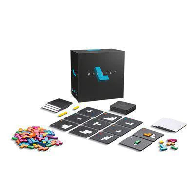 Project L tile-matching game with colorful pieces, black cards, pads, pencils, and box.