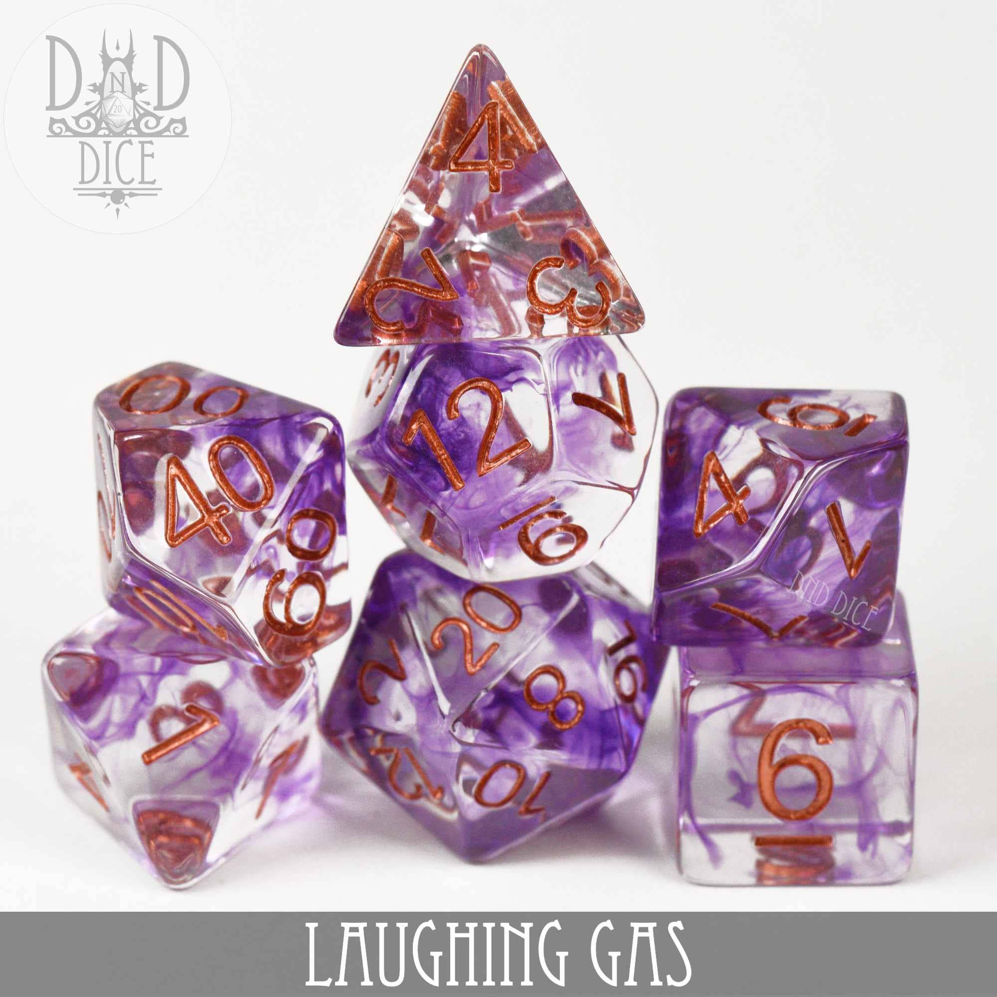 Laughing Gas 7-piece resin dice set, purple and white swirl with orange numbers, arranged in a pyramid.