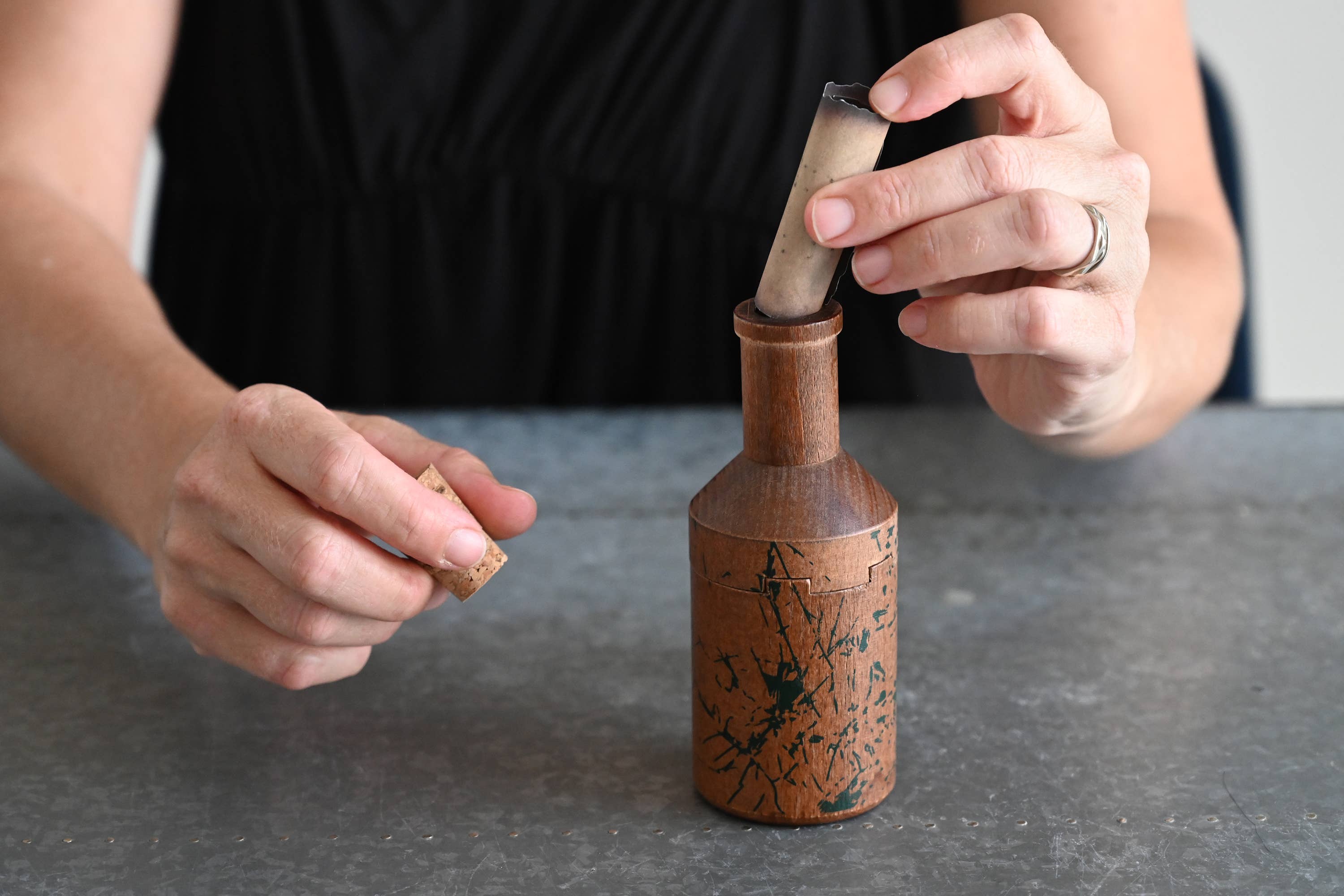 Message in a Bottle Secret Puzzle Box with slot for inserting a note containing a hidden message inside.