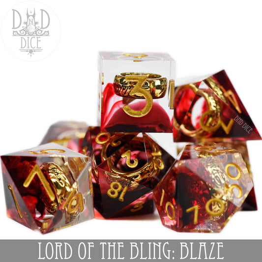 Lord of the Bling: Blaze 7-piece DND dice set, handmade, red and gold with gold rings inside each die.