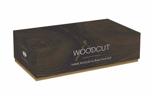 Woodcut: Three Puzzles rectangular box containing three woodcut puzzles by Bryan Nash Gill.