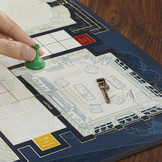 Clue Signature Collection game board with a hand moving a green pawn and small wrench.