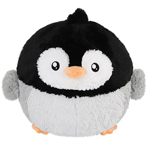 Squishable Baby Penguin plush with black, white, and gray fur, an orange beak, and small orange feet.