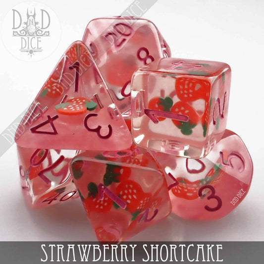 7-piece pink resin dice set featuring embedded strawberry designs, Strawberry Shortcake variant.