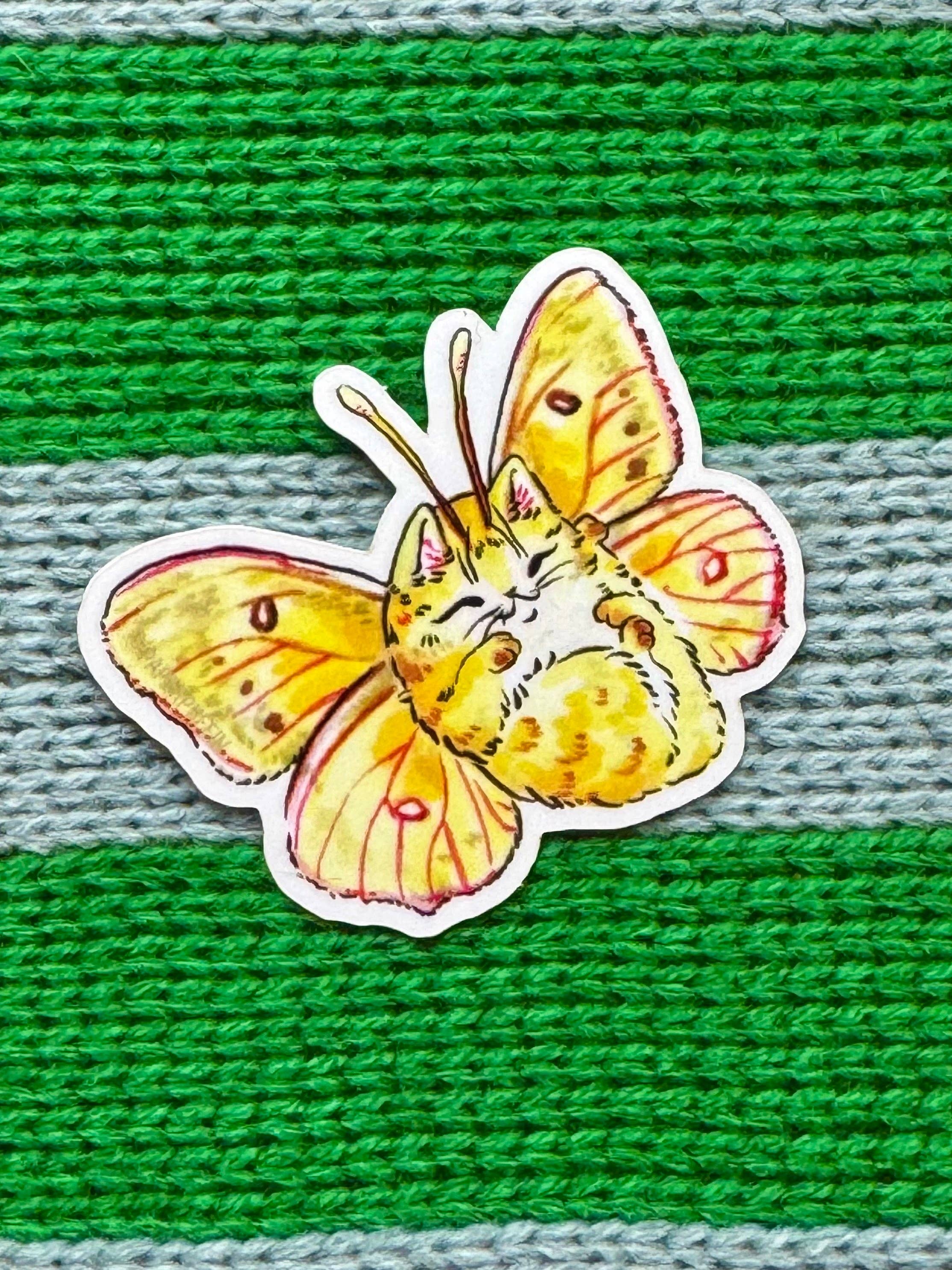 Yellow Catterfly sticker featuring a kitten with butterfly wings.