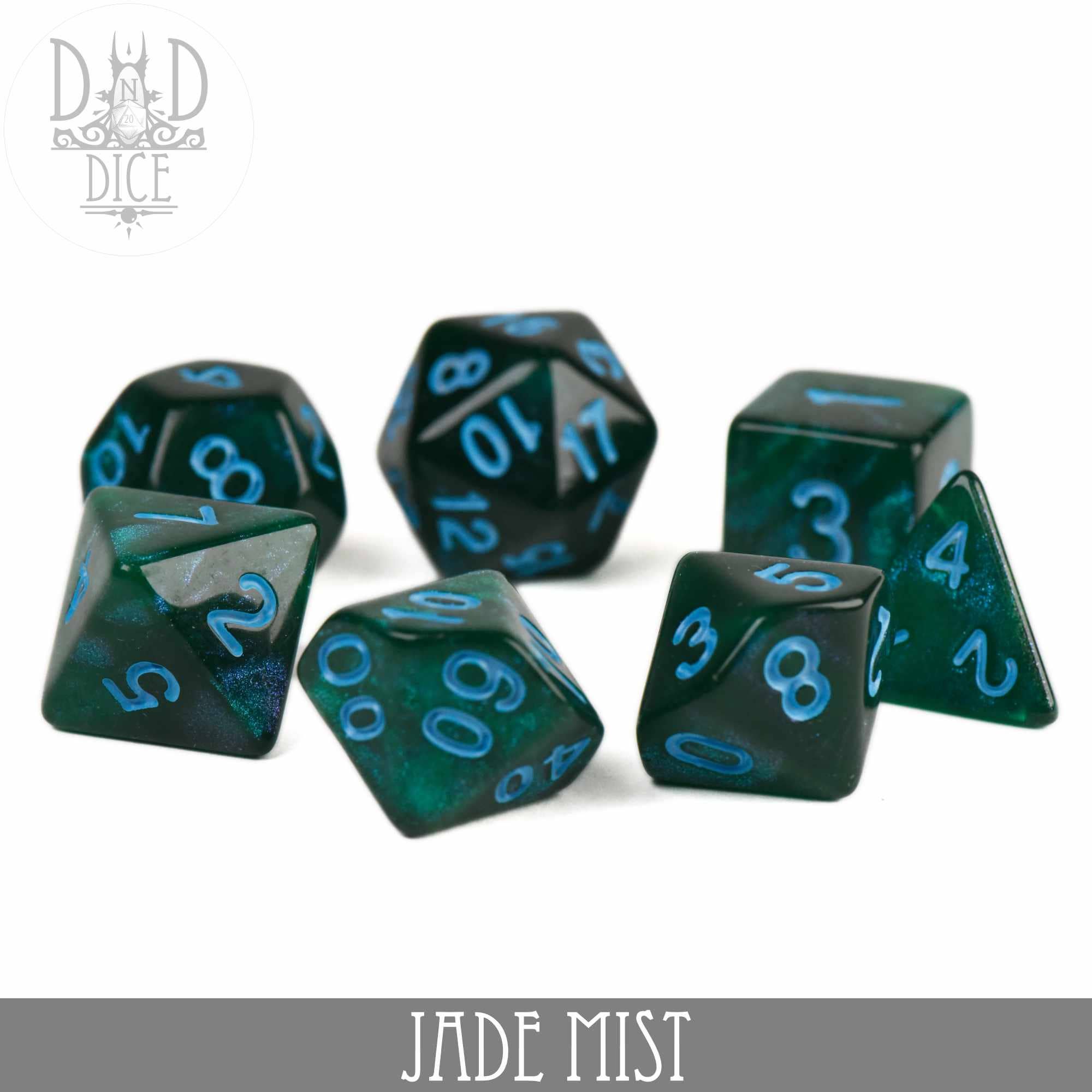 Jade Mist Glitter 7-piece acrylic dice set with blue numbers on a white background.