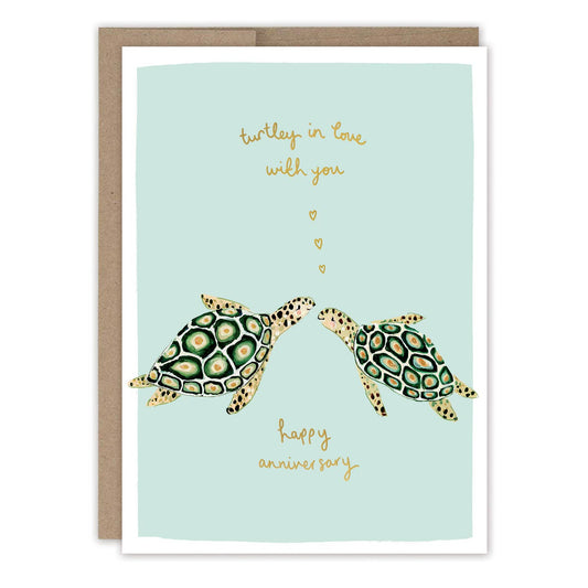 Turtley In Love Anniversary Card with two turtles, hearts, and the message: turtley in love with you.