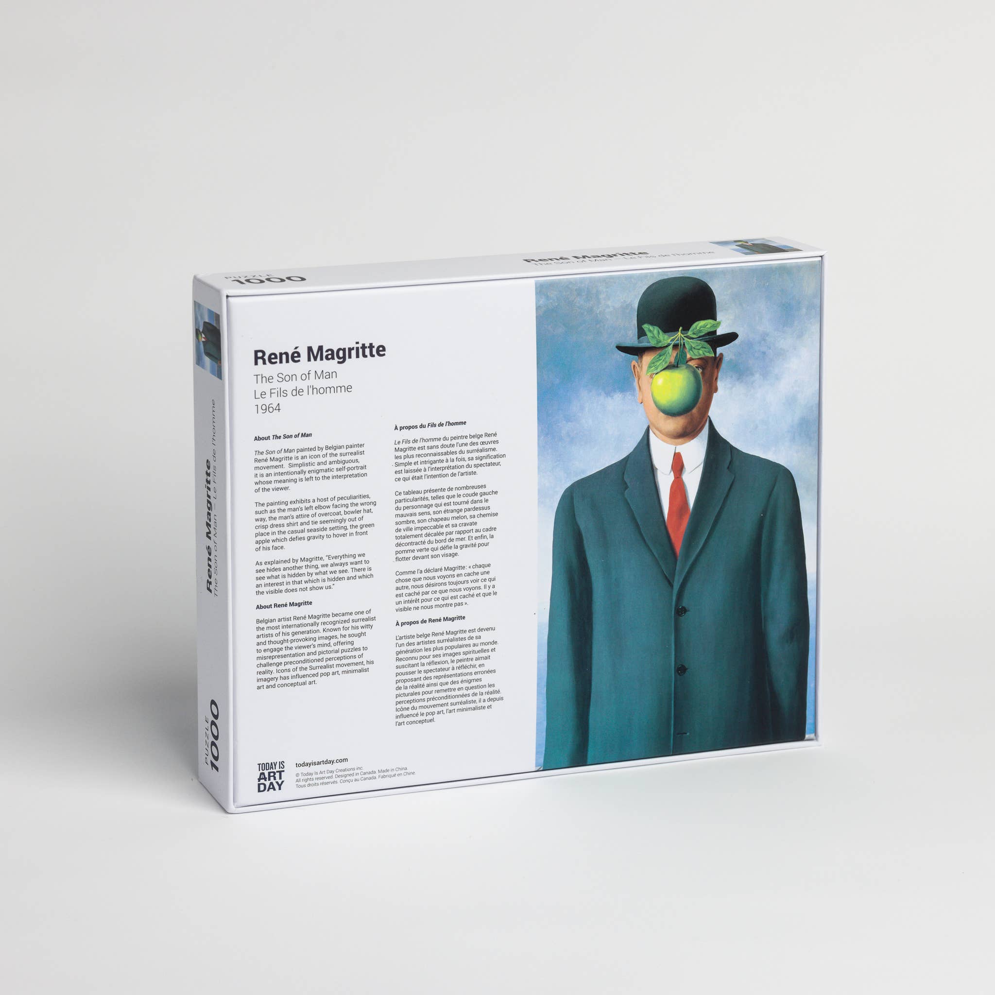 René Magritte Son of Man 1000-piece jigsaw puzzle featuring the suited man with an apple covering his face.